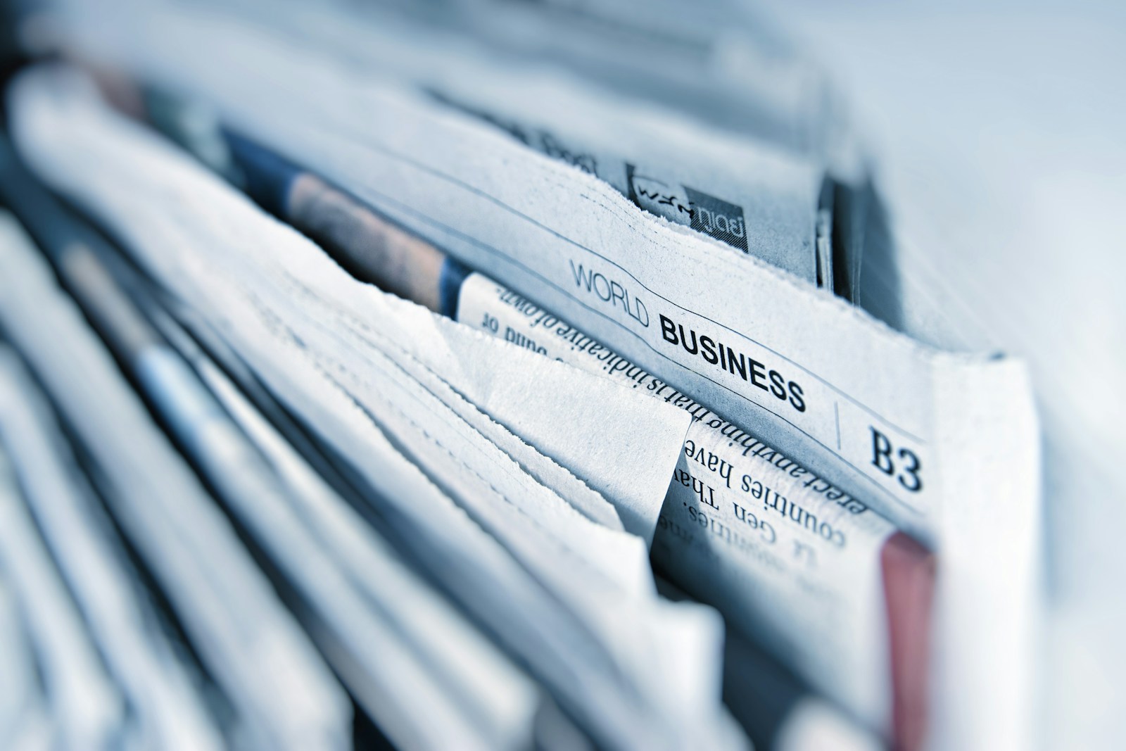 Editorial detail of a technology newsroom nameplate and wire rules